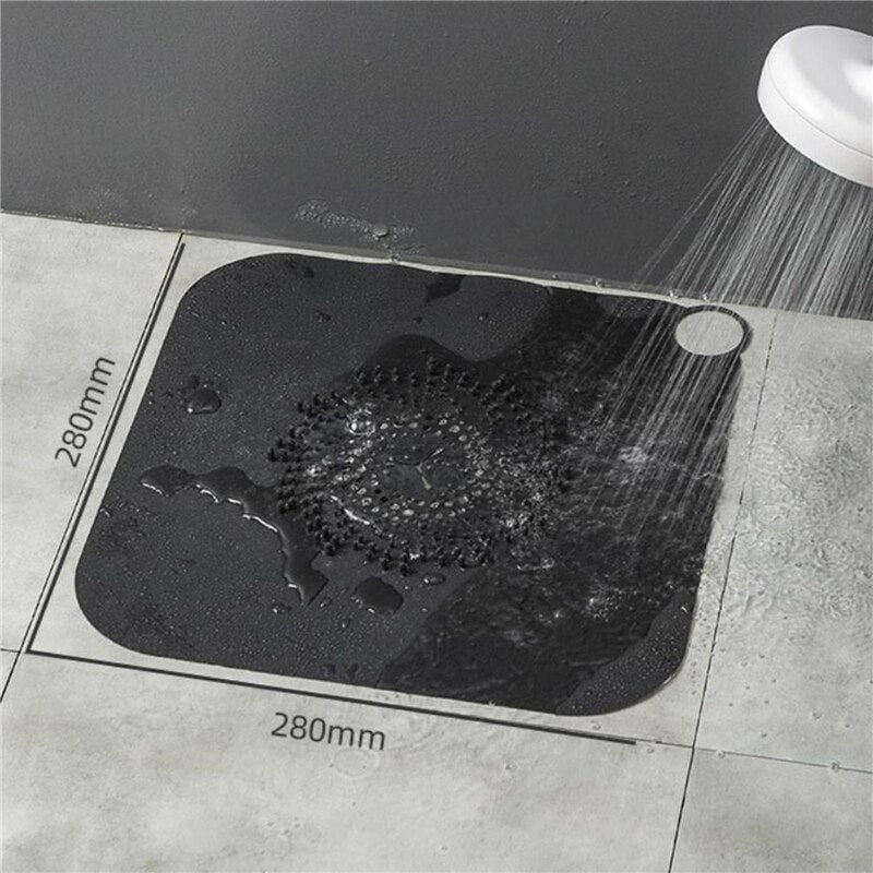 MineralStream Shower Drain Hair Catcher placed over a shower drain